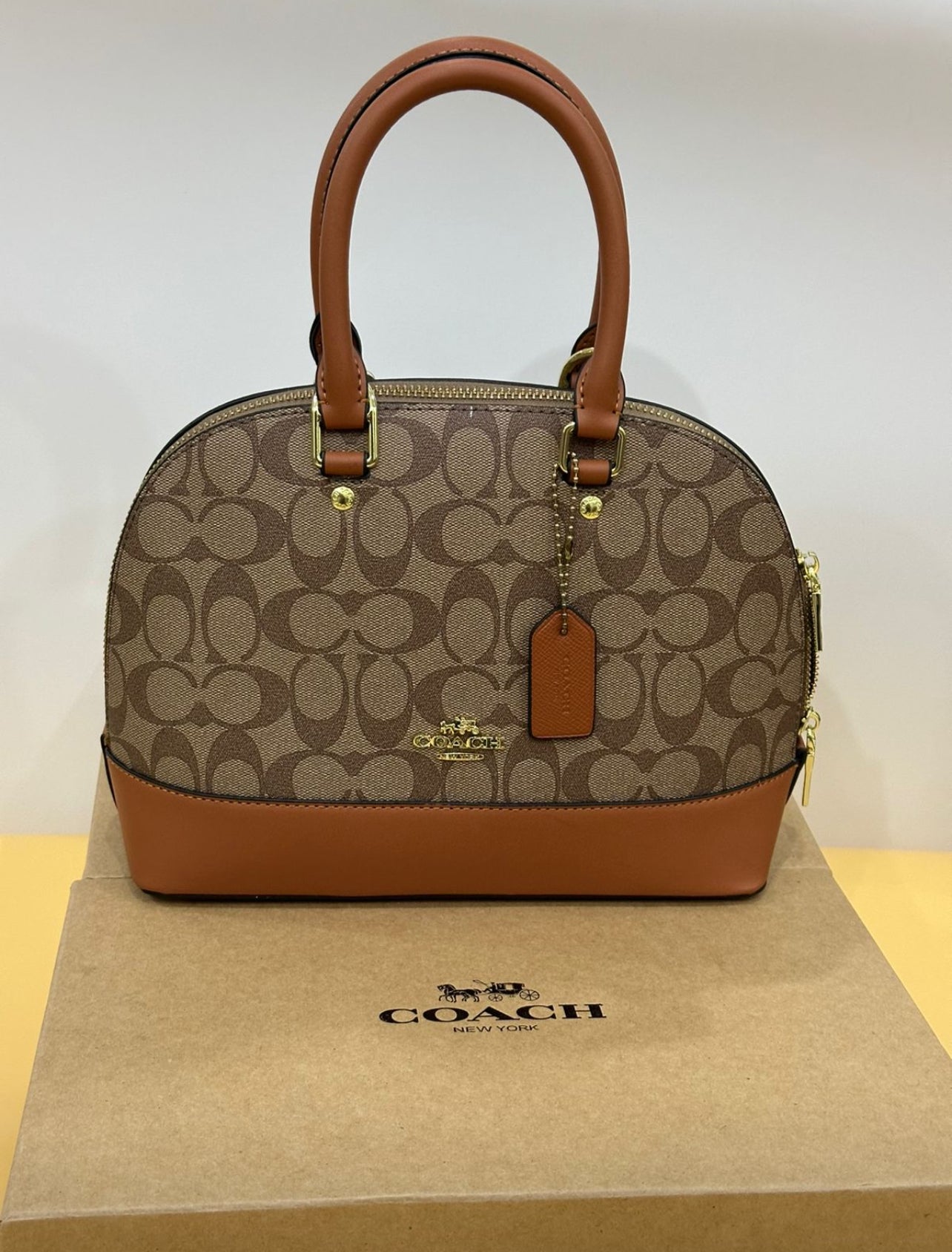 Coach with Brand Box