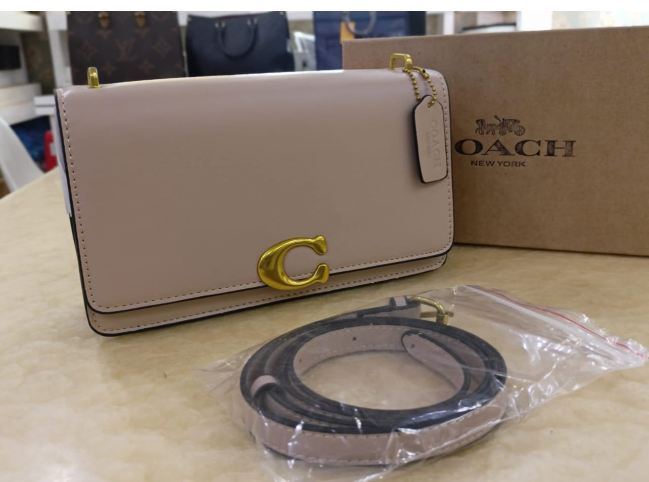 Coach with Brand Box