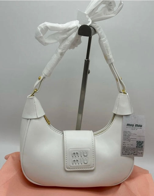 Miu Miu with Brand Box