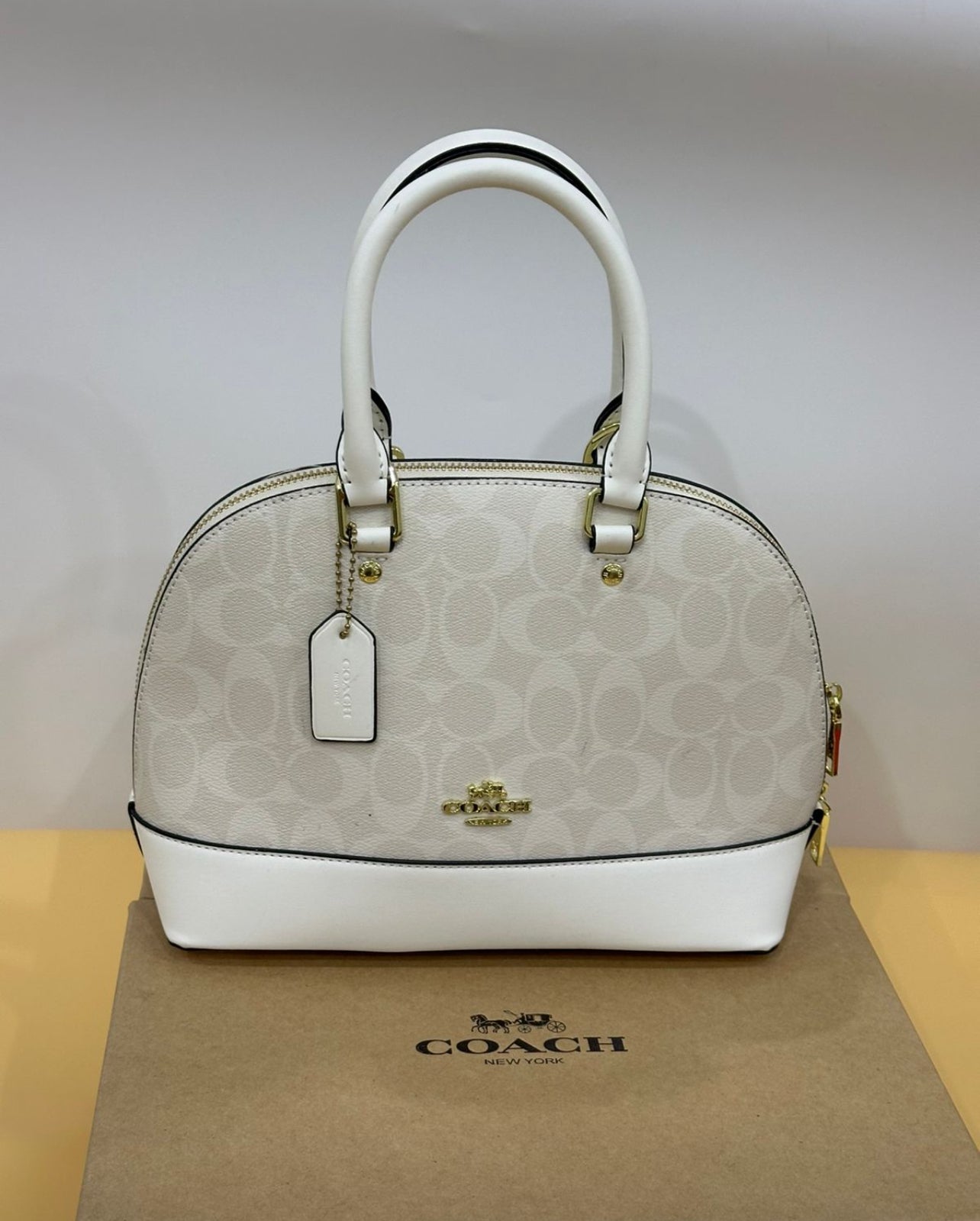 Coach with Brand Box